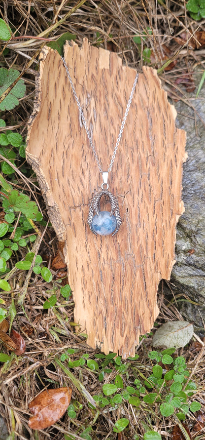 Pendentif "Bonheur" en Aigue marine griffe de dragon
