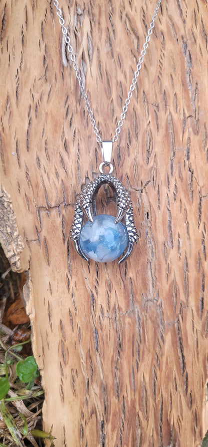 Pendentif "Bonheur" en Aigue marine griffe de dragon